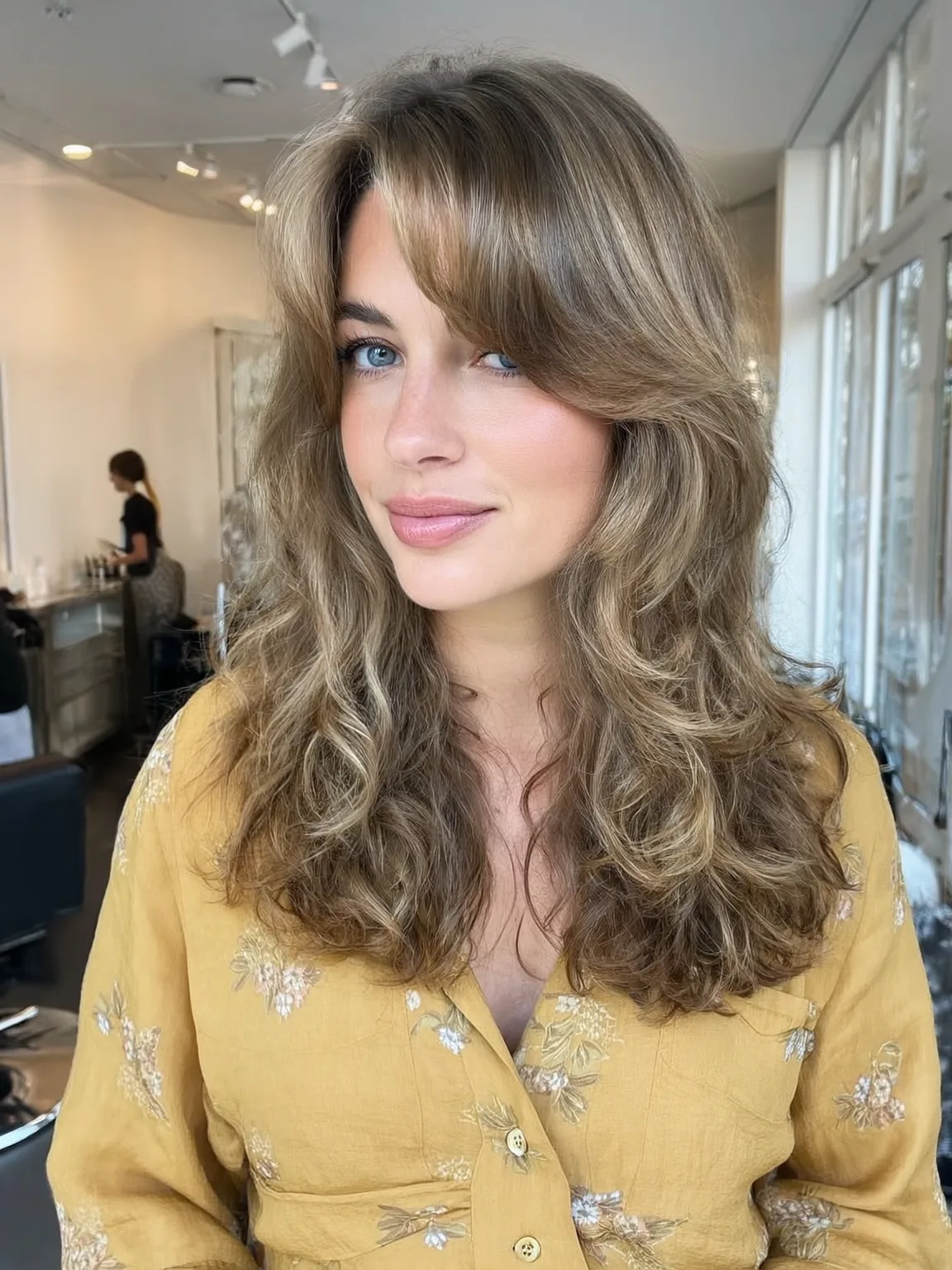 Honey Blonde Balayage Long Layers with Curtain Bangs
